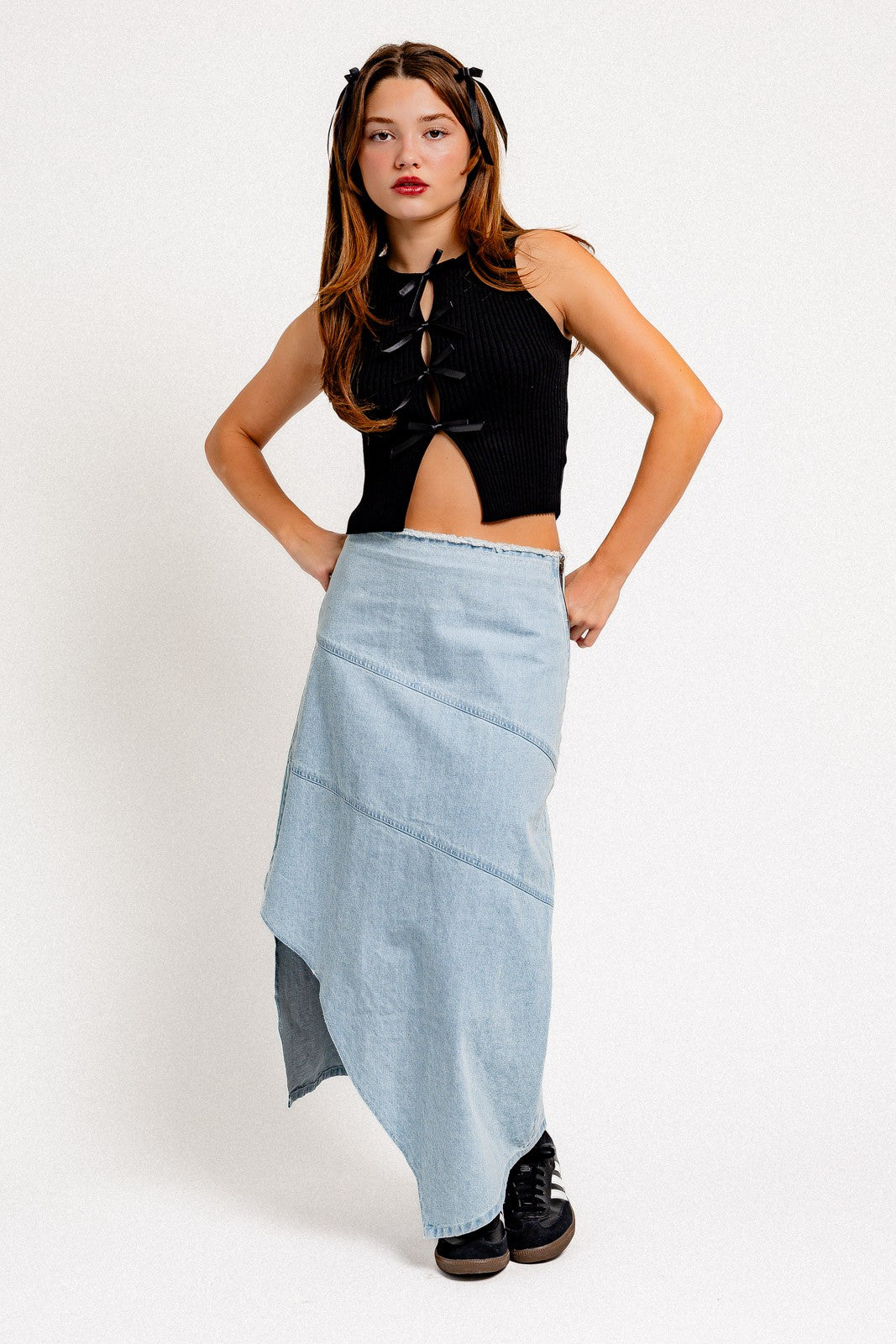 Add elegance to your style with this chic Satin Bow Sleeveless Sweater Top. Made from a soft, lightweight knit, this top has a classic sleeveless design and a feminine satin bow on the front. Perfect for any occasion, pair it with skirts, trousers, or jeans for a stylish and versatile look.