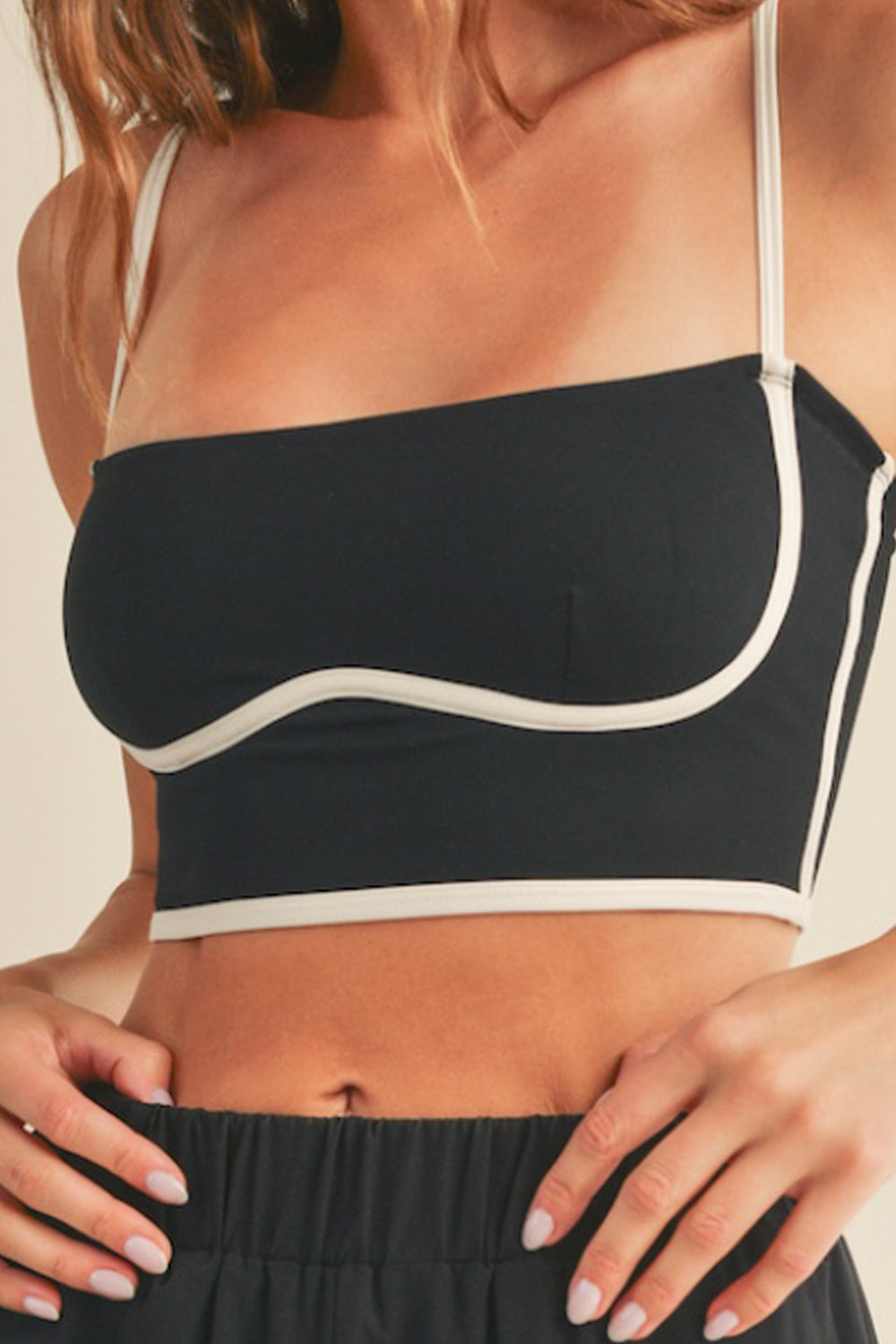 Get the best of both worlds with the Lily Contrasting Sculpting Cami. Designed for light to medium support. The contrast piping detail adds a chic touch, while adjustable straps ensure a perfect fit for all-day comfort and confidence. Stay supported and stylish.