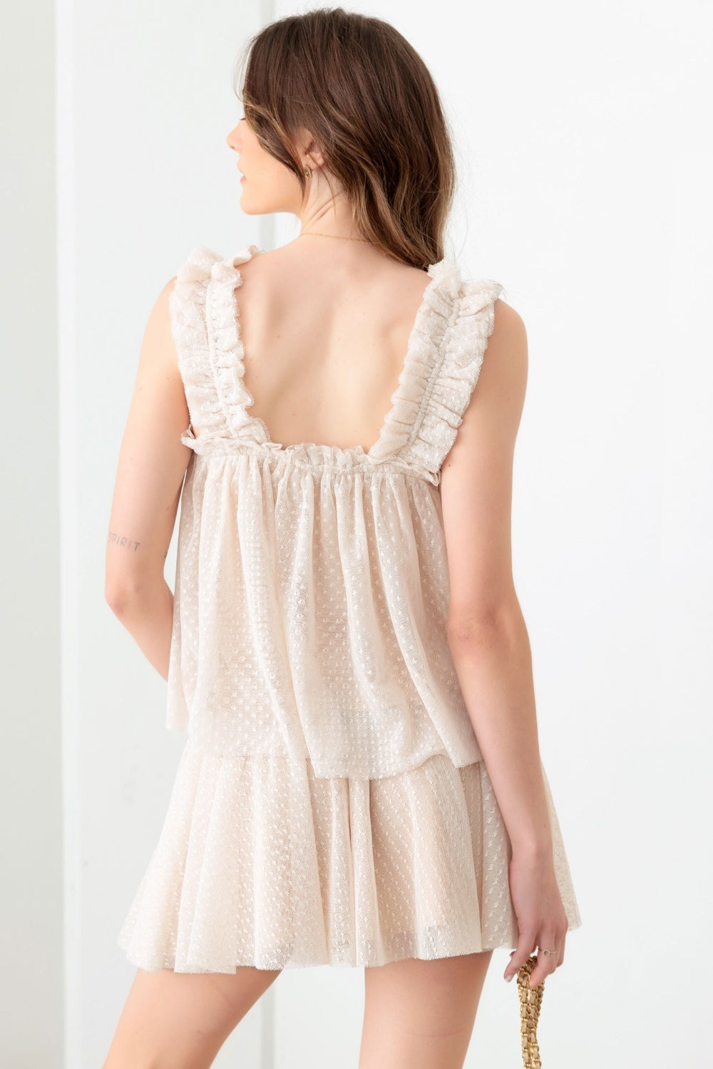Get ready for date night with our Maci Tank & Skirt Set! This romantic set features a sheer pin dot top with wide elastic straps and a square neckline, plus a mini skirt with an elastic waist for a comfy and stylish look. Perfect for a flirty and fun date night.