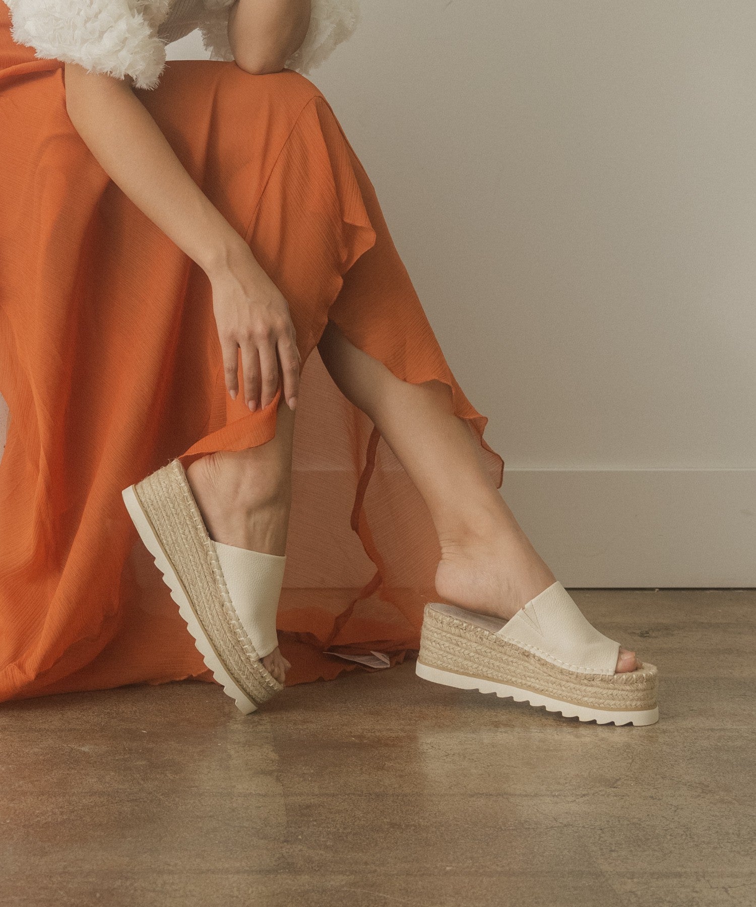 Walk with grace and style in the Ivy Espadrille Platform Slide. The perfect casual and comfortability footwear. With its unique platform design and handcrafted construction, the Ivy Espadrille Platform Slide provides unmatched support and a luxurious feel with each step. Say goodbye to sacrificing comfort for style and experience true luxury with these slides.