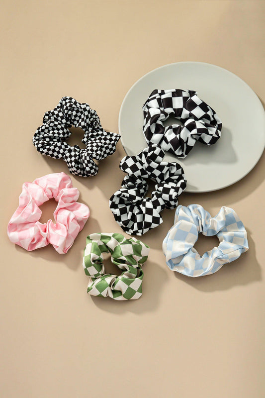 Upgrade your hair accessory collection with the Checker Satin Scrunchies. With its soft satin materials, these scrunchies are gentle on your hair, minimizing breakage and ensuring a comfortable hold.