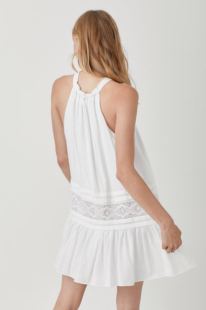 Our Nova Halter Neck Lace Dress adds romance and style to your wardrobe. Its halter neckline with delicate trim and elegant folded detail exudes an effortless vibe and vintage charm.&nbsp;