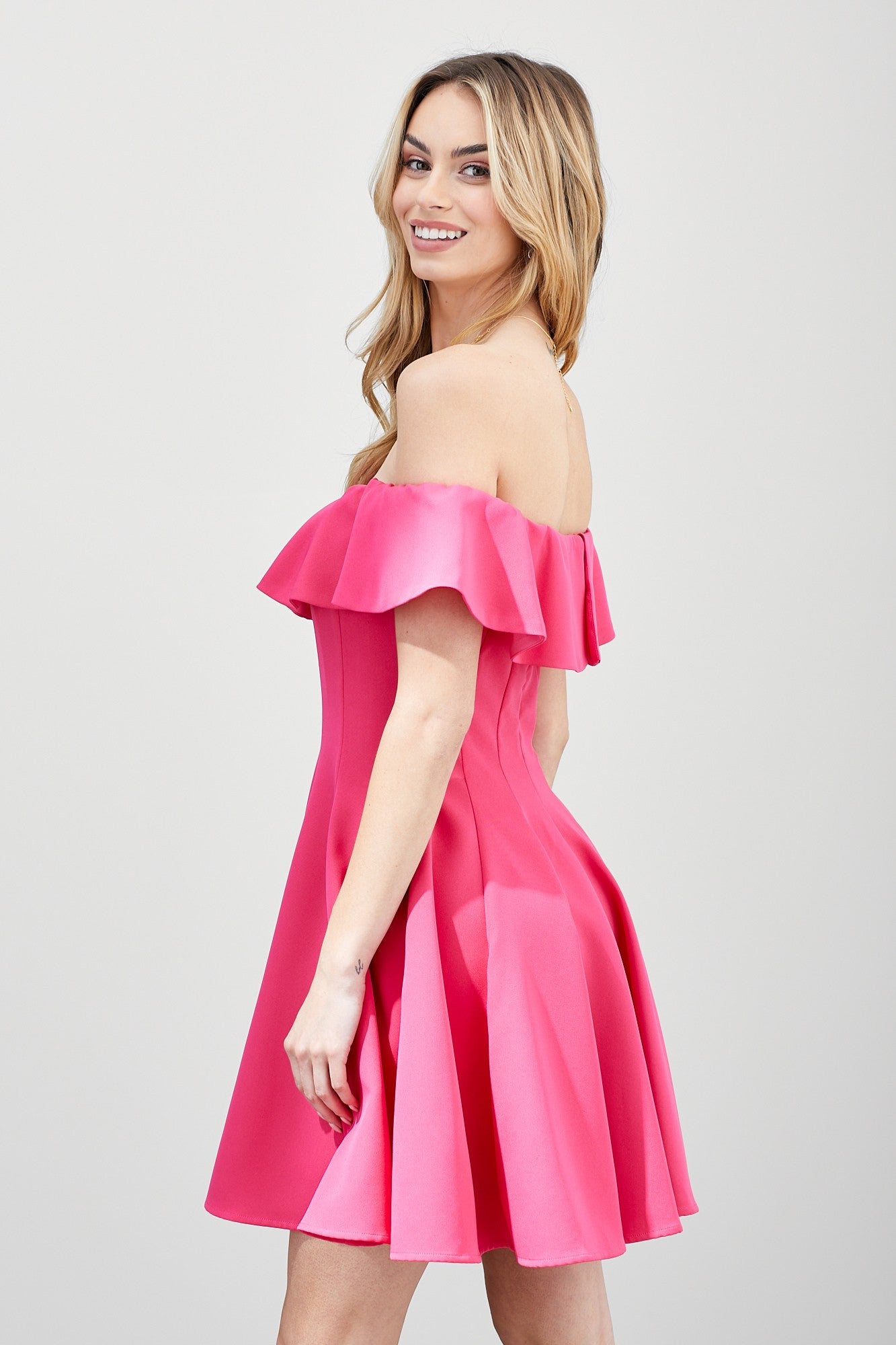 The Isabelle A-Line Ruffle Dress is graceful and feminine. Whether you're attending a garden party, a wedding, or a summer soiree, this dress is the epitome of elegance and versatility.  Model is 5'9" and is wearing a size Small Bust: 32", Waist: 24", Hip: 34"