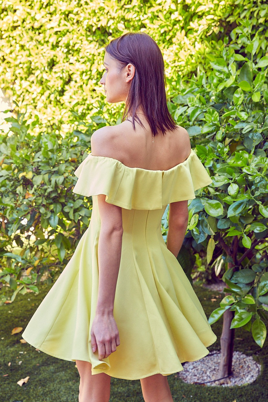 The Isabelle A-Line Ruffle Dress is graceful and feminine. Whether you're attending a garden party, a wedding, or a summer soiree, this dress is the epitome of elegance and versatility.  Model is 5'9" and is wearing a size Small Bust: 32", Waist: 24", Hip: 34"