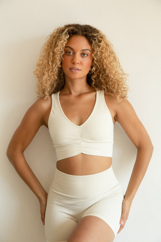 A luxurious activewear set, crafted from the finest Meryl soft premium nylon yarn imported from Spain. Featuring a ribbed waistband and a high rise, this seamless biker shorts set ensures comfort and style all summer long. Pair with the Juno bra top for a vibrant and contemporary look, or style with your favorite jeans for a cool, casual outfit.