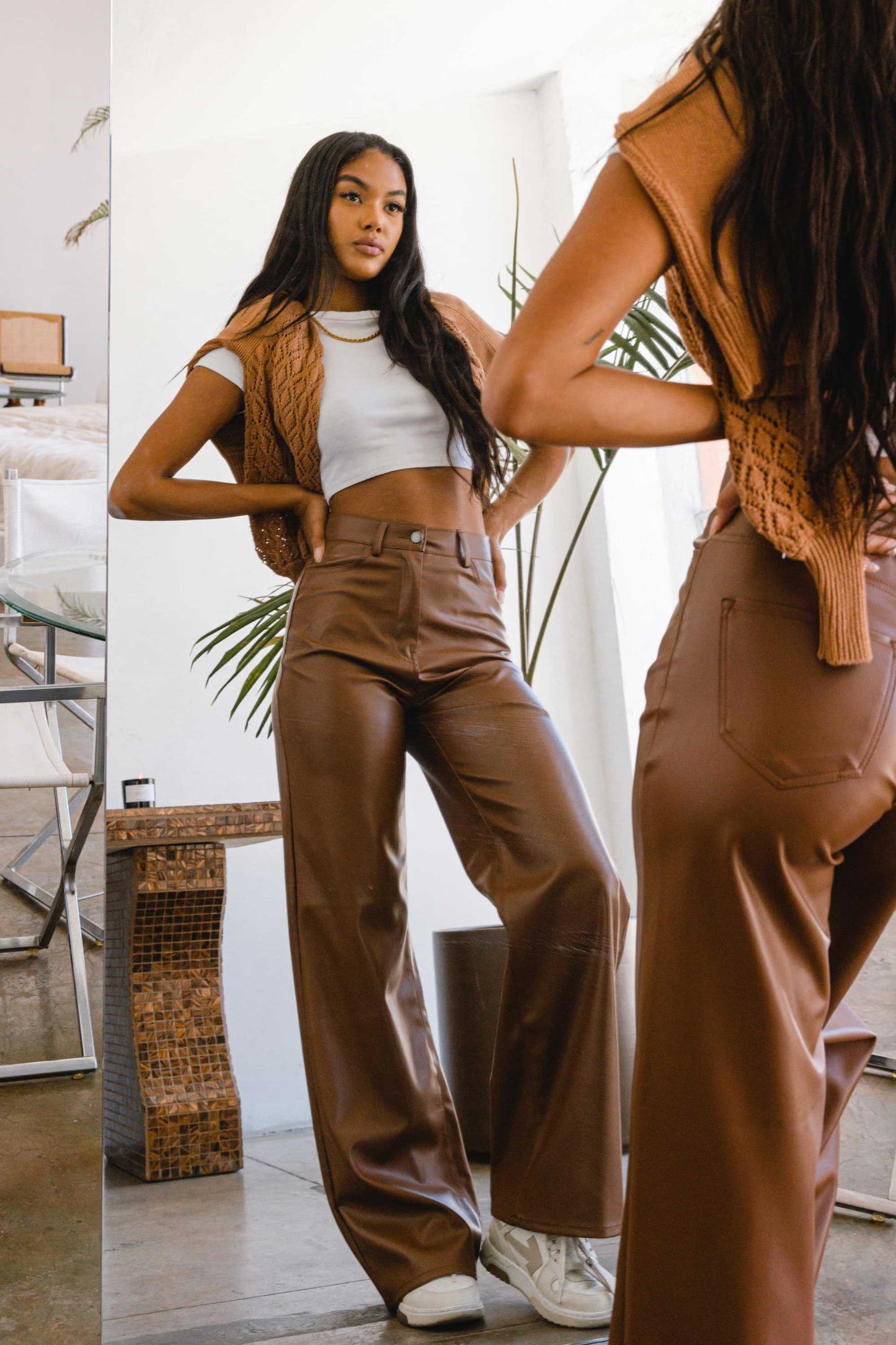 Unleash your stylish side with the Charlotte Vegan Leather Wide Leg Pants! Made from top-quality PU, these pants are both chic and ethical. With front and back pockets for convenience, plus a sleek zip-fly closure, these pants are a must-have for any fashion-forward wardrobe.  Model is 5'8" and wearing a size 3