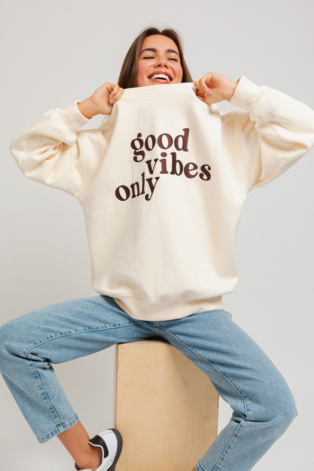 Stay warm and stylish with our oversized sweatshirt featuring embroidered letters and designs. Personalize your outfit with this cozy fashion statement.  Model is 5'8" and is wearing a size small Bust: 32A, Waist: 24", Hips: 34"