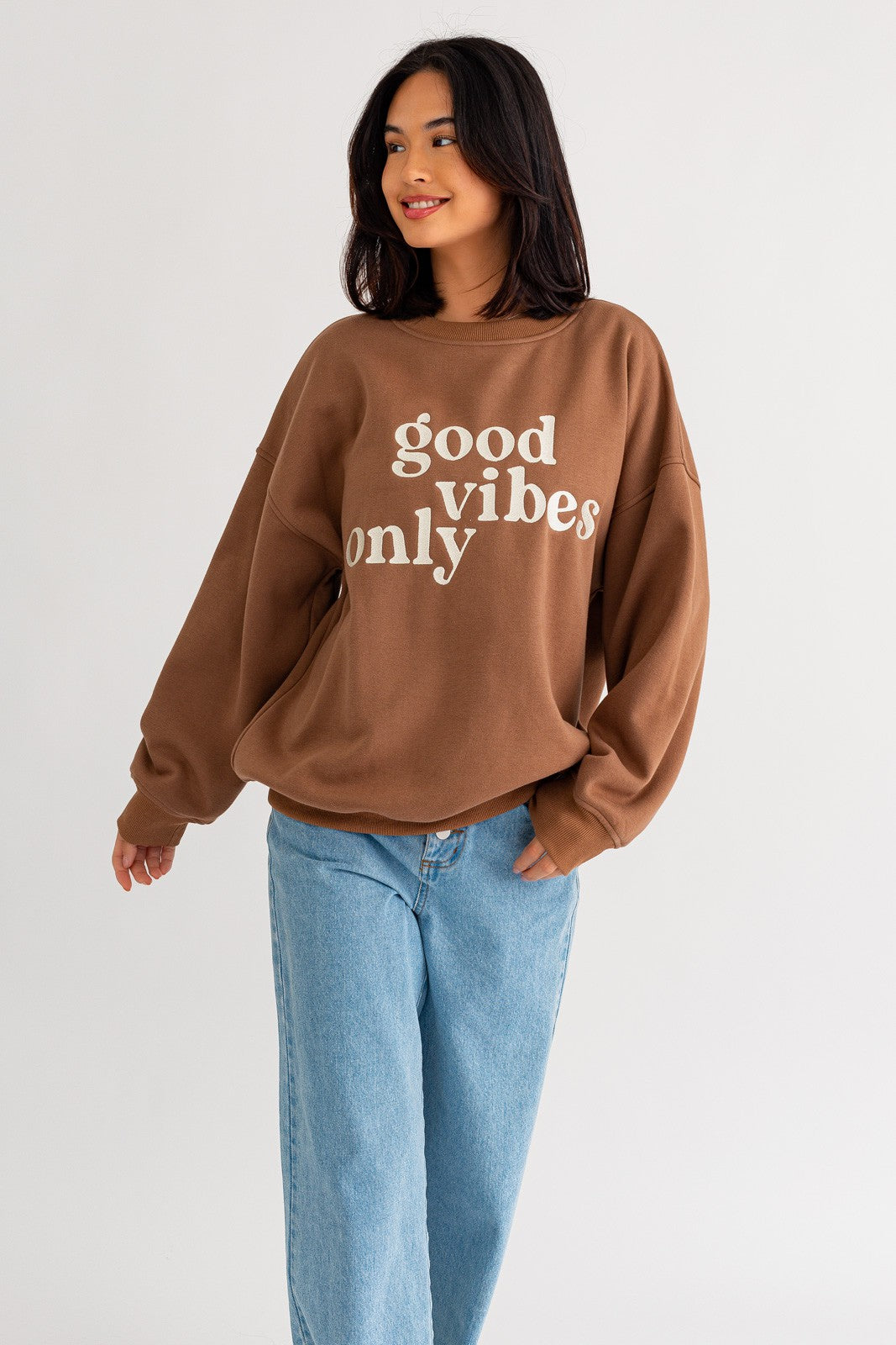 Stay warm and stylish with our oversized sweatshirt featuring embroidered letters and designs. Personalize your outfit with this cozy fashion statement.  Model is 5'8" and is wearing a size small Bust: 32A, Waist: 24", Hips: 34"