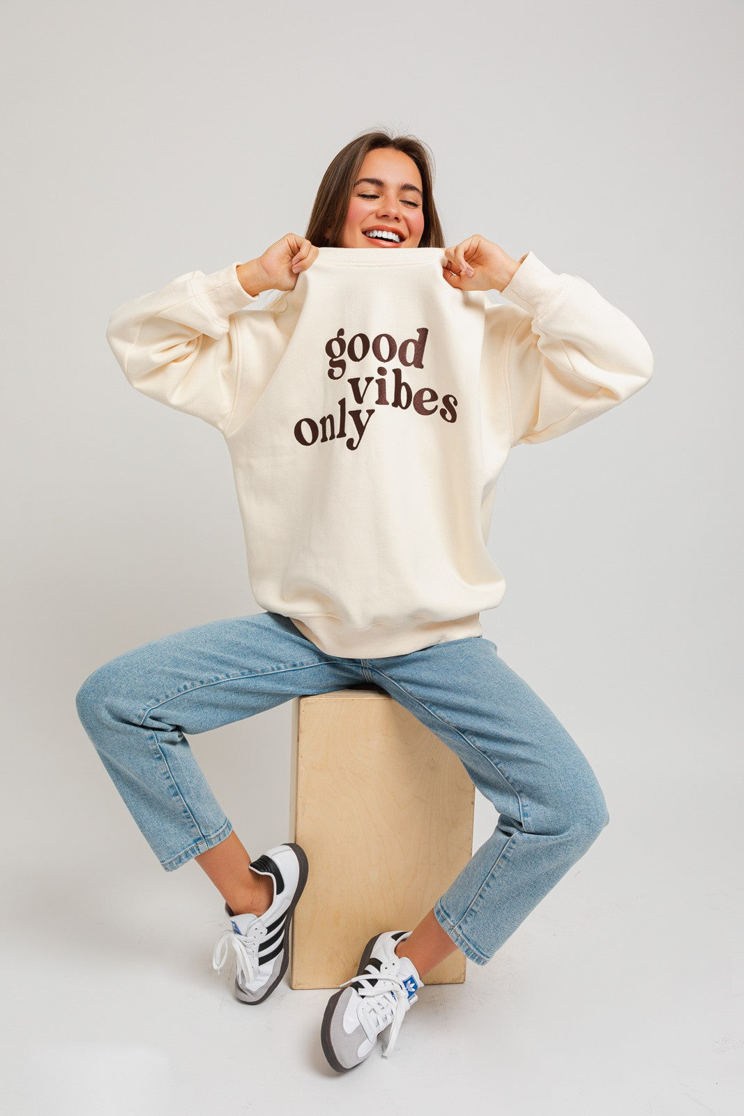 Stay warm and stylish with our oversized sweatshirt featuring embroidered letters and designs. Personalize your outfit with this cozy fashion statement.  Model is 5'8" and is wearing a size small Bust: 32A, Waist: 24", Hips: 34"