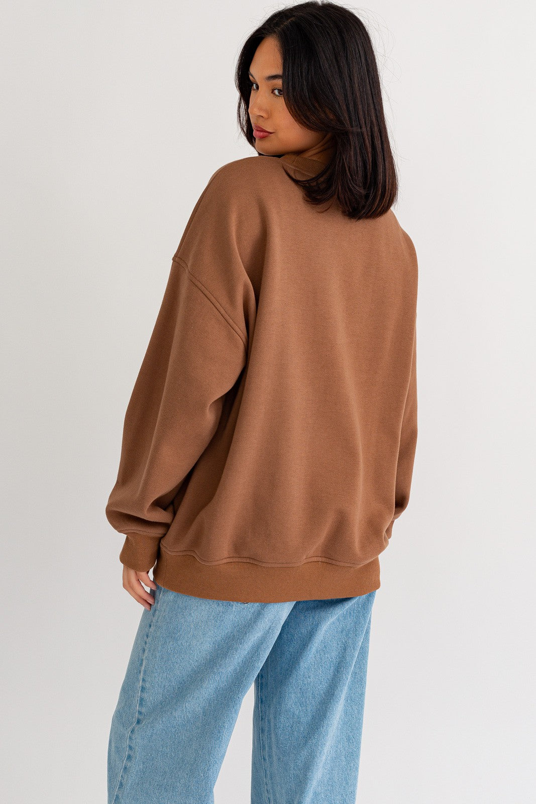 Stay warm and stylish with our oversized sweatshirt featuring embroidered letters and designs. Personalize your outfit with this cozy fashion statement.  Model is 5'8" and is wearing a size small Bust: 32A, Waist: 24", Hips: 34"