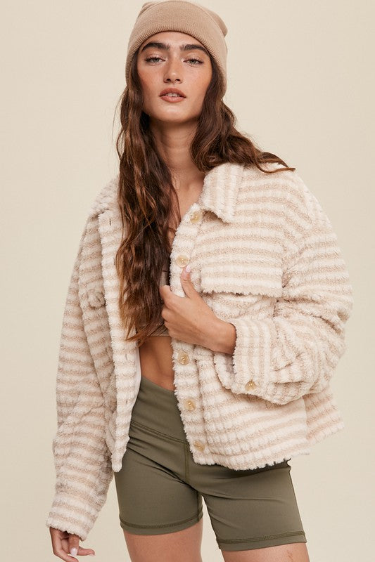 Get ready to cozy up in style with our Camila Button Down Plaid Fleece Jacket. This versatile piece combines the comfort of a fleece jacket with the trendy silhouette of a shirt, making it perfect for chilly days. This Loose Fitting Fleece Jacket is a must-have addition to your casual wardrobe for staying warm and fashionable all season long.