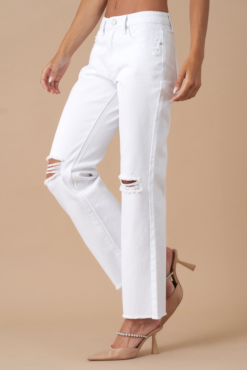 Get ready to rock with these Morgan High Rise Slim Straight jeans made from 100% cotton. Featuring knee distressing for a relaxed fit, these White Denim jeans have 5 pockets and are proudly Designed In USA.  Model is wearing size 3/25, Height 5'8 Waist: 29 1/2, Hip: 38 1/2 Front Rise - 10, Leg Opening - 18, Inseam - 29