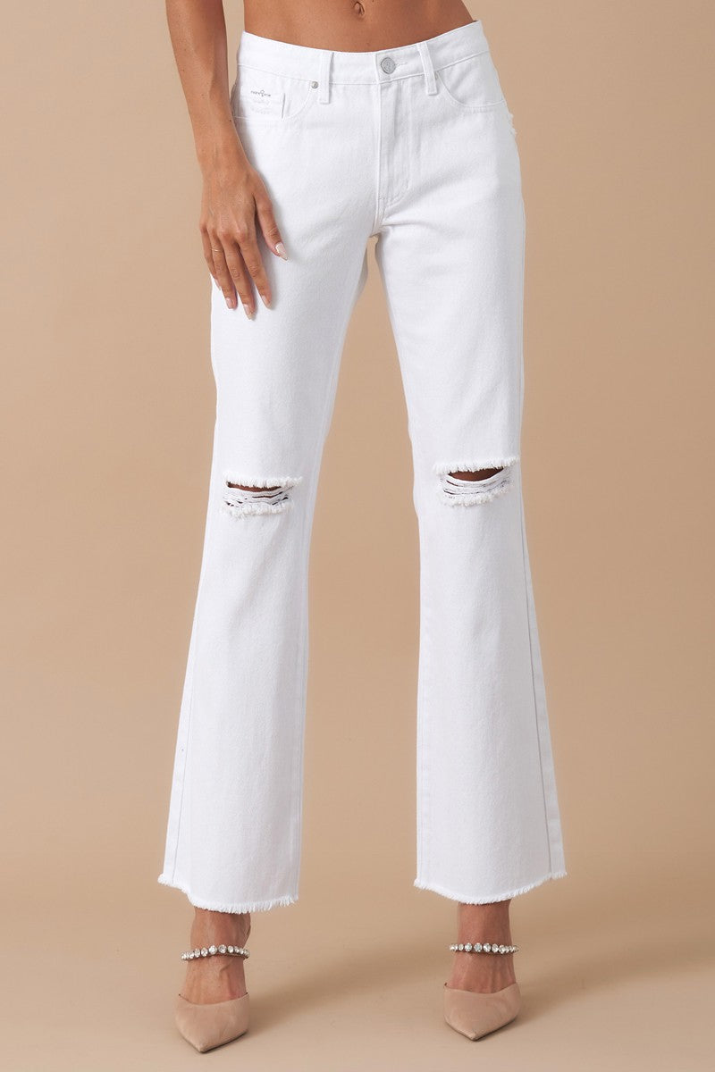 Get ready to rock with these Morgan High Rise Slim Straight jeans made from 100% cotton. Featuring knee distressing for a relaxed fit, these White Denim jeans have 5 pockets and are proudly Designed In USA.  Model is wearing size 3/25, Height 5'8 Waist: 29 1/2, Hip: 38 1/2 Front Rise - 10, Leg Opening - 18, Inseam - 29