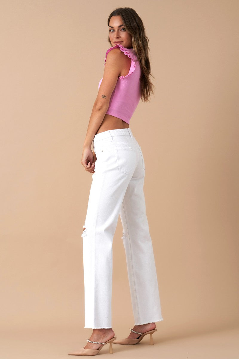 Get ready to rock with these Morgan High Rise Slim Straight jeans made from 100% cotton. Featuring knee distressing for a relaxed fit, these White Denim jeans have 5 pockets and are proudly Designed In USA.  Model is wearing size 3/25, Height 5'8 Waist: 29 1/2, Hip: 38 1/2 Front Rise - 10, Leg Opening - 18, Inseam - 29