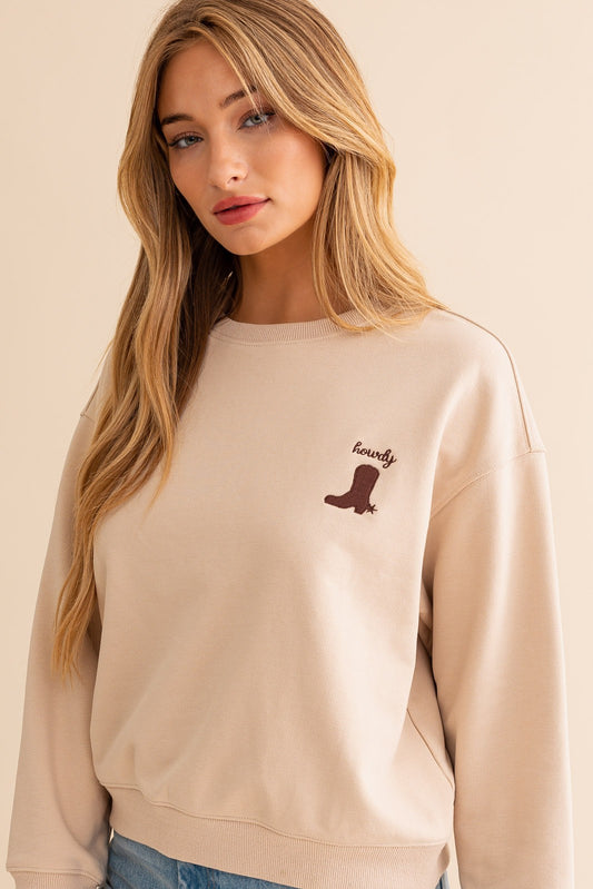This sweatshirt offers a cozy and relaxed fit that's perfect for lounging, running errands, or layering during cooler days. With its minimalist design, it's a versatile piece that easily pairs with your favorite jeans, leggings, or shorts.