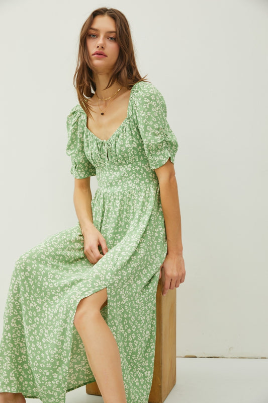 Introducing the Hazel Floral Slit Dress, a charming and stylish choice for the summer time. Made from lightweight and flowy fabric. Perfect for daytime events or a night out. Fall in love this summer with this romantic and versatile dress that exudes effortless charm!