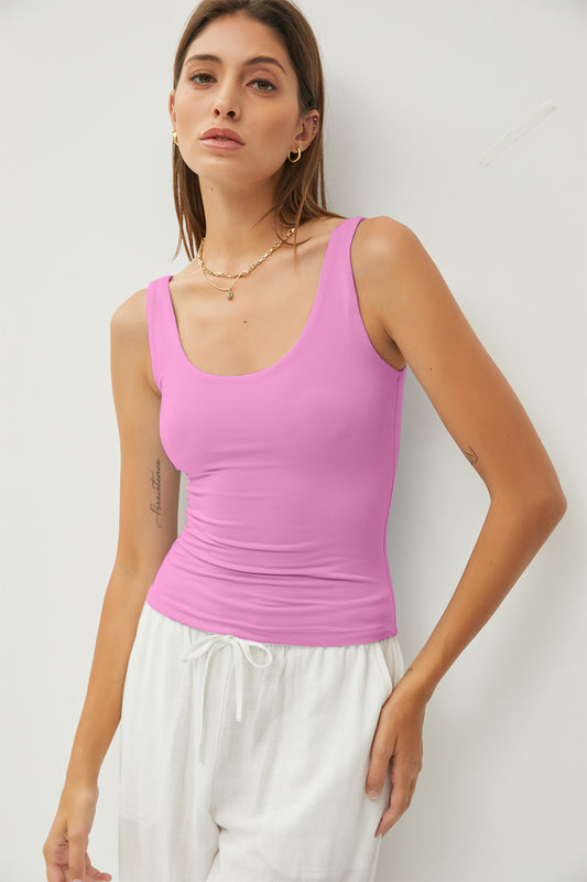 Introducing the Camila Scoop Neck Tank! Made from soft and stretchy fabric, it offers a flattering and comfortable silhouette. Elevate your everyday look with this wardrobe essential that can be easily dressed up or down!