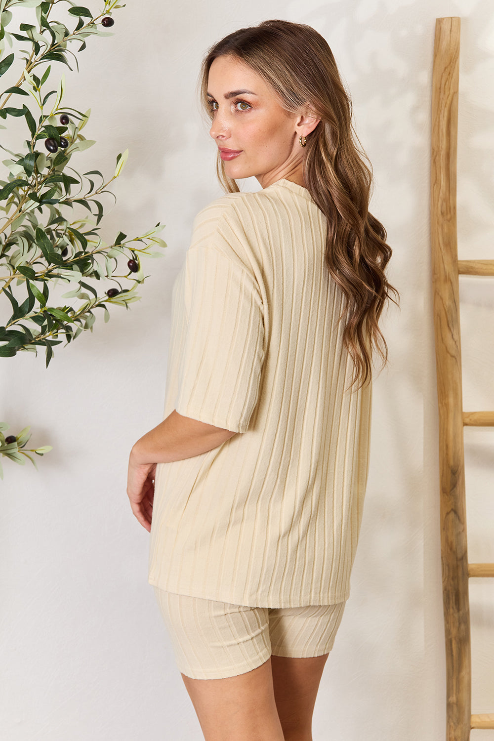 The Ribbed Round Neck Top and Shorts Lounge Set is a comfortable and stylish option for loungewear or casual wear. With its ribbed texture and matching top and shorts, this set provides a coordinated and trendy look while offering maximum comfort. Lounge Wear