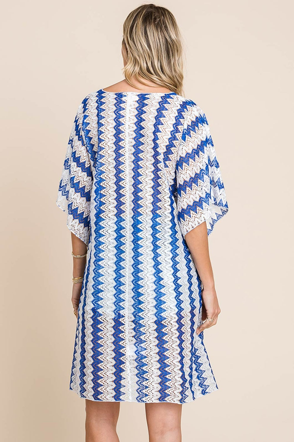 Featuring a classic striped pattern, plunging neckline, and tied details, this versatile piece is perfect for any warm day. Layer over swimsuits or pair with shorts for a trendy summer look. Effortlessly elevate your beach style with our Lola Crochet Lace Cover Up in Blue.