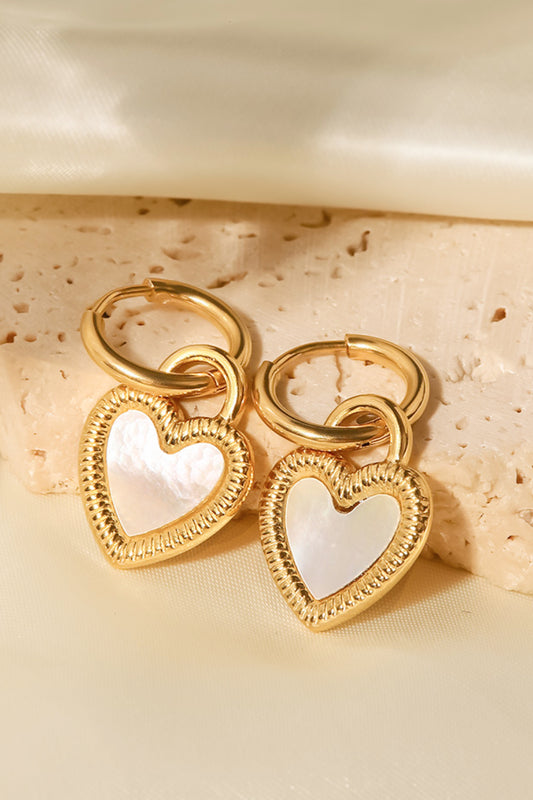 These stainless steel Heart Drop Earrings in gold will add the perfect touch of heart-warming style to your outfit. A must-have, love-infused accessory for any jewelry collection! Express your personality with one-of-a-kind flair!