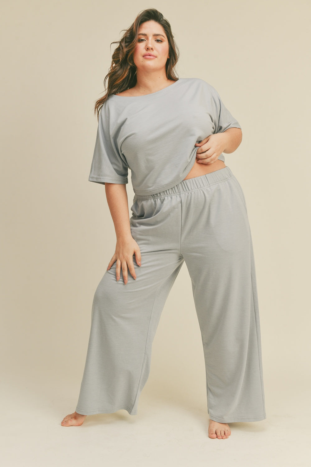 Indulge in the comfort of the Kimberly Cropped Top and Wide Leg Pants Lounge Set, offering a baby soft feel against your skin. The relaxed fit ensures unrestricted movement, creating a laid-back vibe perfect for unwinding at home or tackling casual errands. With its stylish design and cozy feel, this lounge set is your go-to choice for leisurely days or evenings spent in pure relaxation.