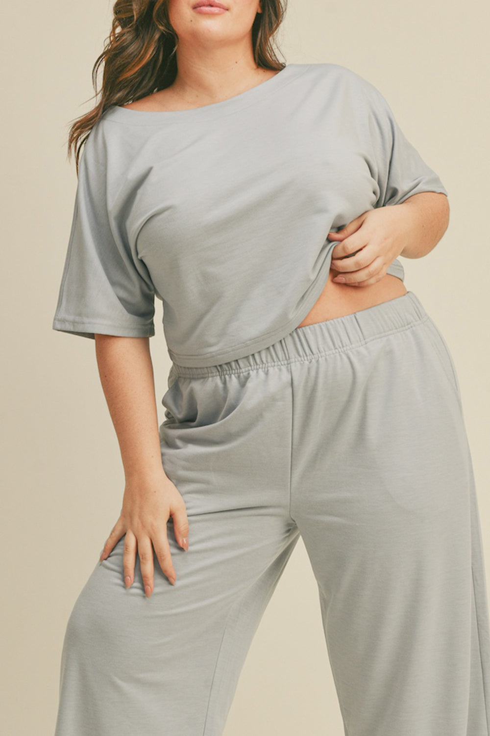 Indulge in the comfort of the Kimberly Cropped Top and Wide Leg Pants Lounge Set, offering a baby soft feel against your skin. The relaxed fit ensures unrestricted movement, creating a laid-back vibe perfect for unwinding at home or tackling casual errands. With its stylish design and cozy feel, this lounge set is your go-to choice for leisurely days or evenings spent in pure relaxation.