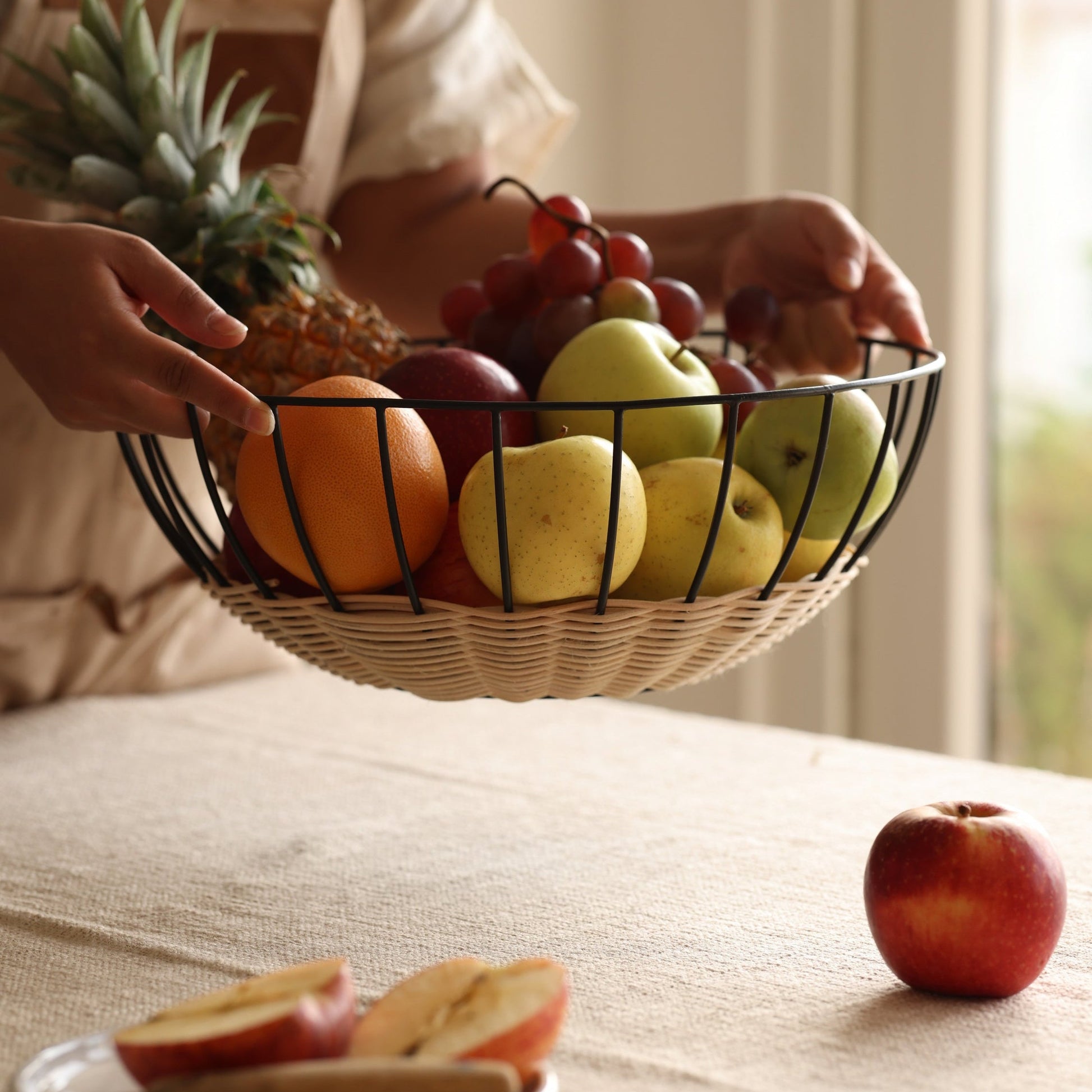 The Cabo Rattan Basket turns your grocery store produce into a beautiful still-life piece. Woven with natural rattan, this airy basket would elevate your centrepiece display of fruit, vegetables or ornamental objects. 
    * Natural Rattan on Powder coated Iron
    * Size:  35 cms Width x 12 cms Height / 13.8" round x 4.72" Height
Note: Please keep away from high moisture places. Wipe clean with a dry soft cloth. 