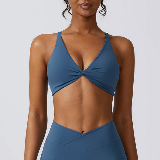 Make a statement while you sweat with this Spaghetti Strap Front Twist Sport Bra! Get you some coverage and support while turning heads with its twist front feature. Keep it low-key but fashionable so you can focus on the workout, not the distractions. Knock it out of the park and feel confident at the same time! Spaghetti Strap Sports Bra, Front Twist Athletic Bra, Women's Active Wear, Workout Sports Bra, Fitness Bra, Blue Sport Bra