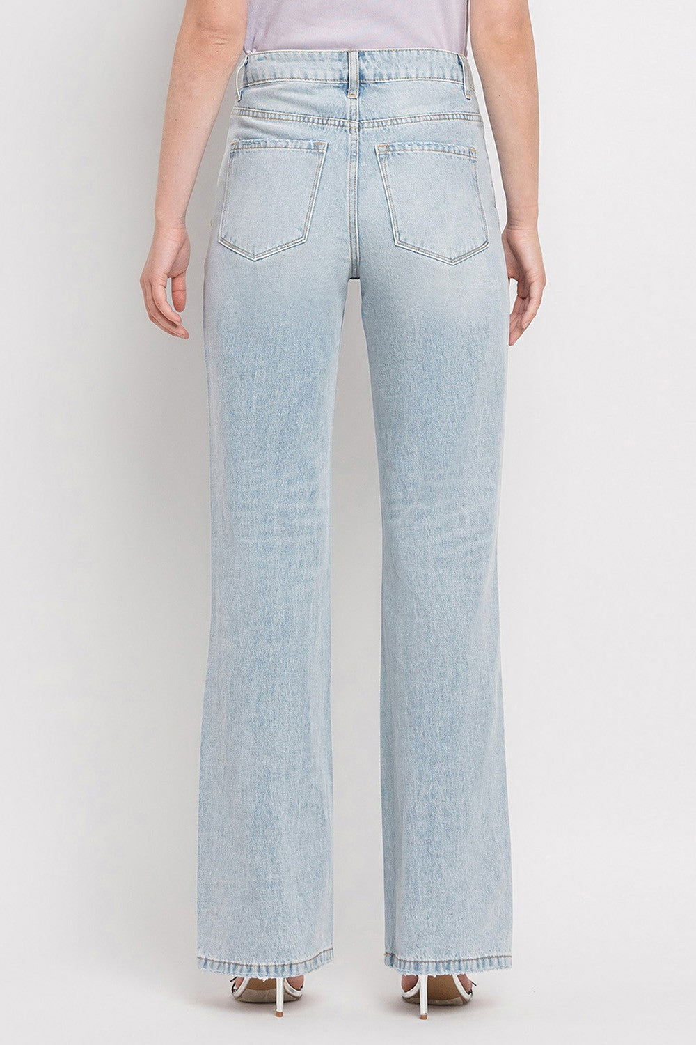 The Eloise 90's Vintage Super High Rise Flare Jeans are a trendy and nostalgic denim option that features a super high-rise waist and wide flare legs, reminiscent of the popular fashion from the 1990s. These jeans offer a retro-inspired silhouette that is both flattering and stylish.&nbsp;