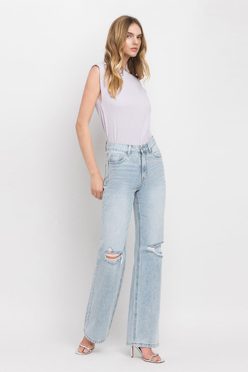 The Eloise 90's Vintage Super High Rise Flare Jeans are a trendy and nostalgic denim option that features a super high-rise waist and wide flare legs, reminiscent of the popular fashion from the 1990s. These jeans offer a retro-inspired silhouette that is both flattering and stylish.&nbsp;