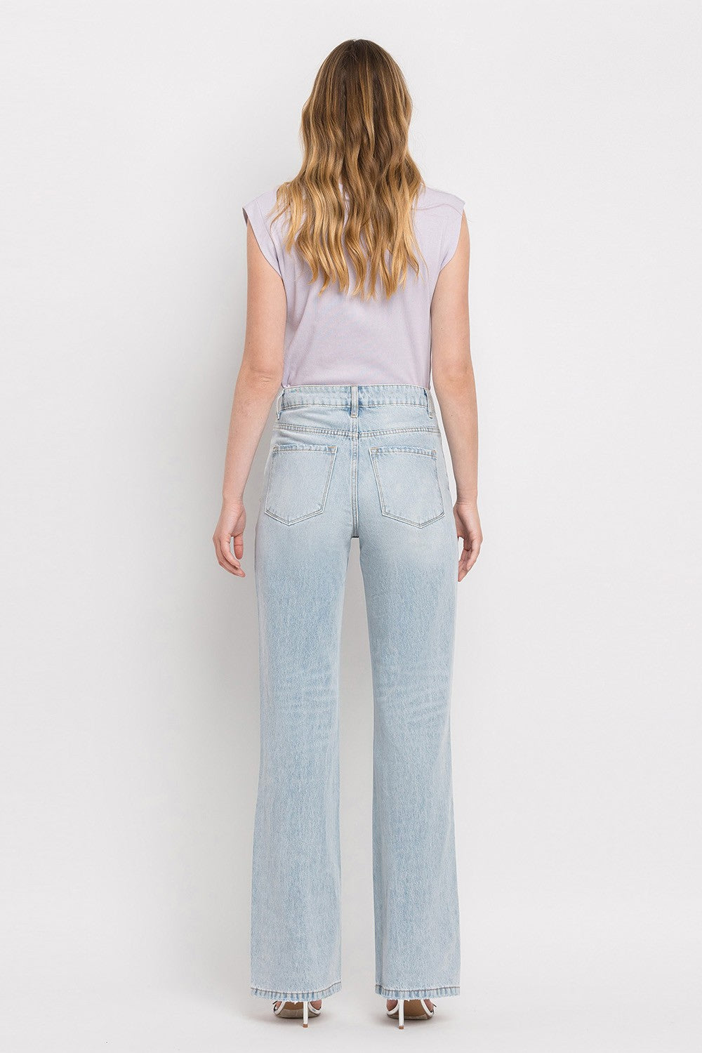 The Eloise 90's Vintage Super High Rise Flare Jeans are a trendy and nostalgic denim option that features a super high-rise waist and wide flare legs, reminiscent of the popular fashion from the 1990s. These jeans offer a retro-inspired silhouette that is both flattering and stylish.&nbsp;