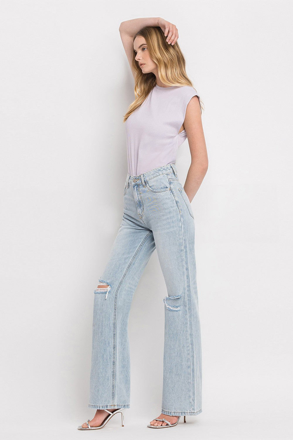 The Eloise 90's Vintage Super High Rise Flare Jeans are a trendy and nostalgic denim option that features a super high-rise waist and wide flare legs, reminiscent of the popular fashion from the 1990s. These jeans offer a retro-inspired silhouette that is both flattering and stylish.&nbsp;