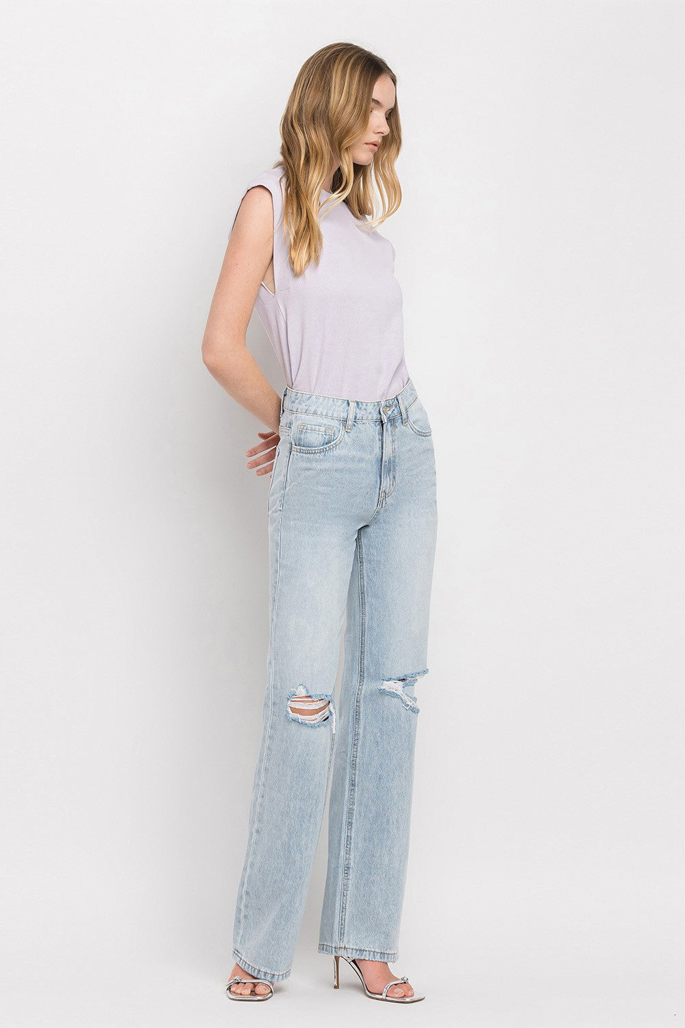 The Eloise 90's Vintage Super High Rise Flare Jeans are a trendy and nostalgic denim option that features a super high-rise waist and wide flare legs, reminiscent of the popular fashion from the 1990s. These jeans offer a retro-inspired silhouette that is both flattering and stylish.&nbsp;