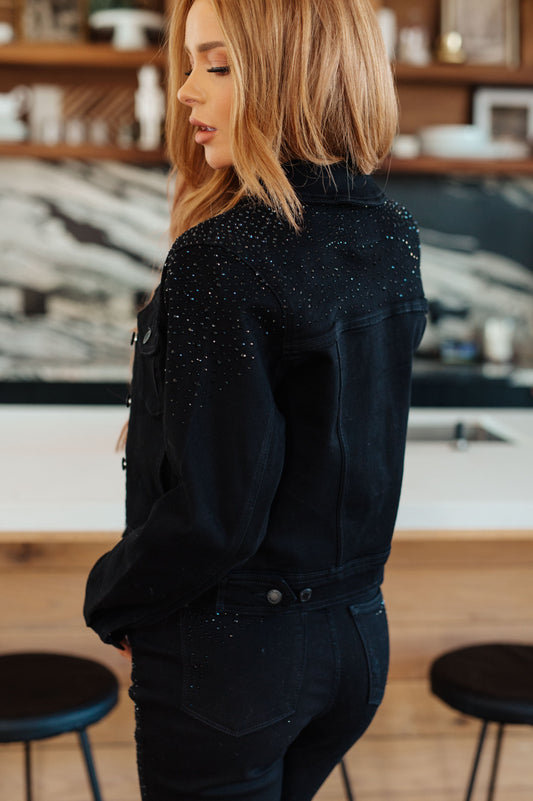 This Reese Rhinestone Denim Jacket is the perfect combination of casual and glamorous! Crafted from comfy 4-Way stretch denim and embellished with rhinestones, you'll turn heads everywhere you go. Get ready to make a statement!