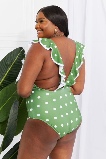 Make your inner beach babe shine by wearing a suit that makes you feel confident. This one is designed with a deep neckline and a ruffle trim. You can get double the use of this swimsuit by styling it as a bodysuit under a skirt or pair of jeans. Note: Runs small, order one size up. If between sizes or have a long torso, please size up.
